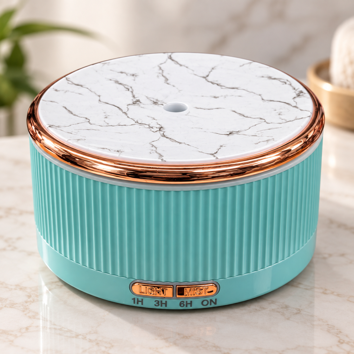 Aqua marble-top aromatherapy diffuser with metallic trim