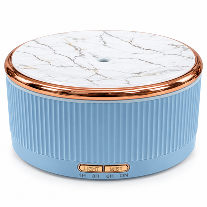 Sky blue ribbed diffuser with metallic trim and marble-look top